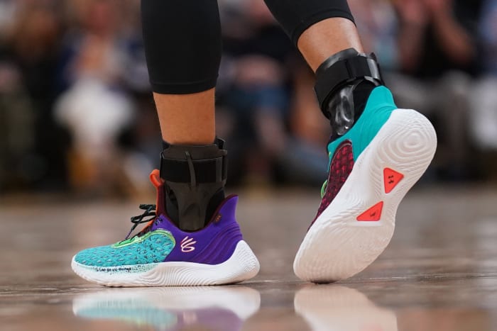 Golden State Warriors point guard Stephen Curry wearing the Curry Flow 9 'Black History Month'.